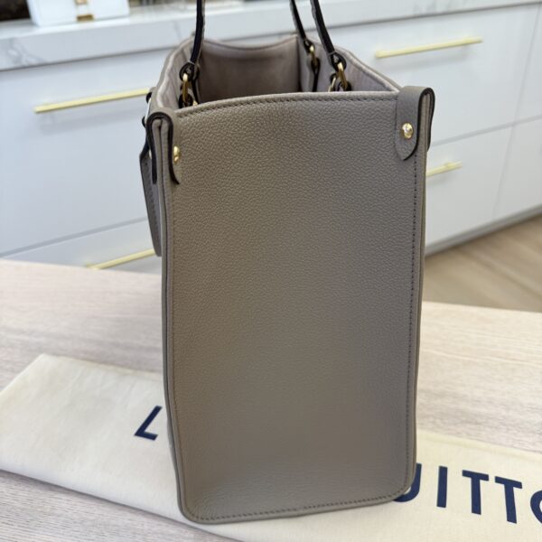 Louis Vuitton Empreinte Monogram Giant Onthego MM Dove and Creme