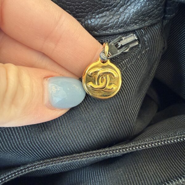 Chanel 24K Triple CC Backpack Black Gold Hardware