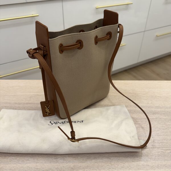 Saint Laurent (YSL) Brown Leather and Canvas Bucket Bag With Cassandre Charm