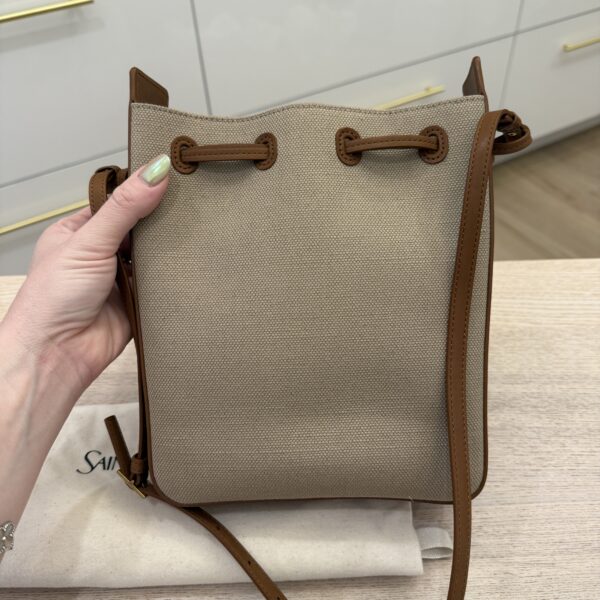 Saint Laurent (YSL) Brown Leather and Canvas Bucket Bag With Cassandre Charm