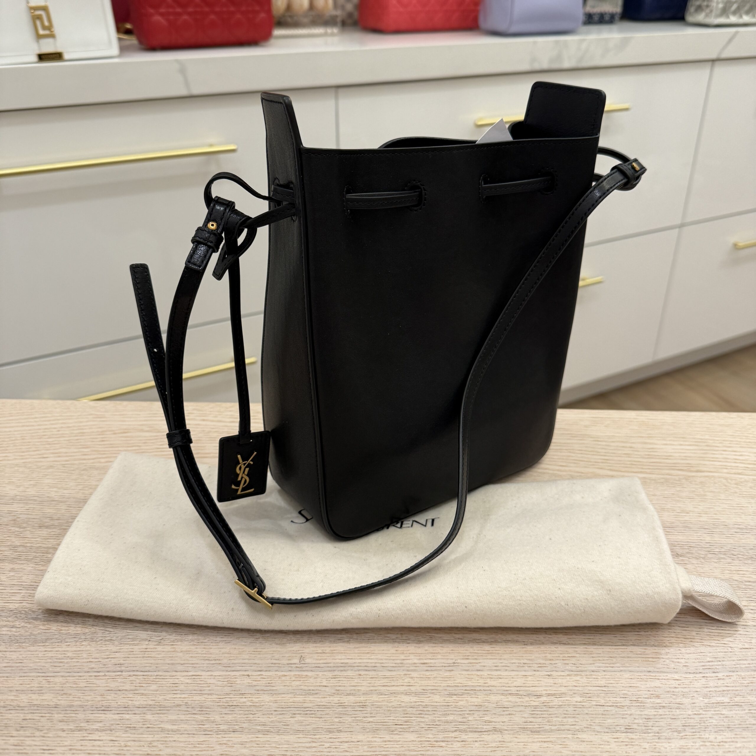 Saint Laurent (YSL) Black Leather Bucket Bag With Cassandre Charm