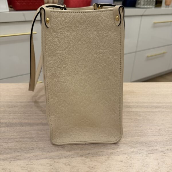 Louis Vuitton Empreinte Monogram Giant Onthego MM Creme