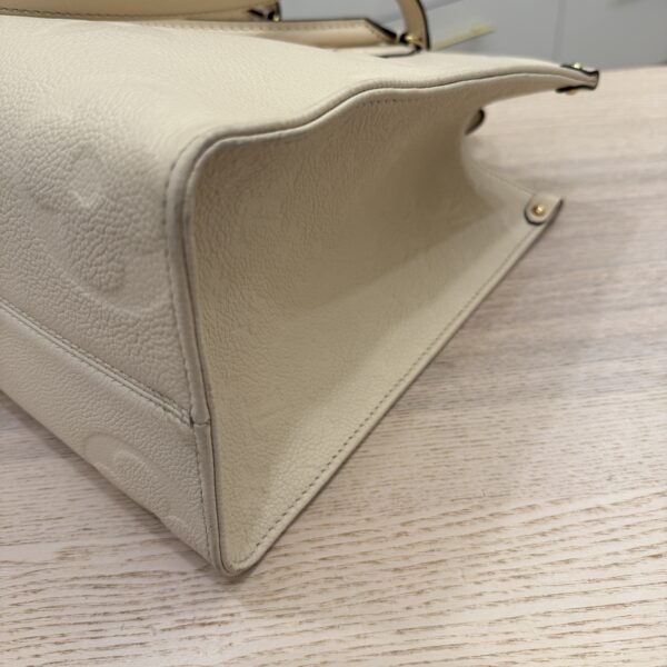 Louis Vuitton Empreinte Monogram Giant Onthego MM Creme