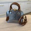 Louis Vuitton Alma Handbag Metallic Monogram Vernis with Leather BB