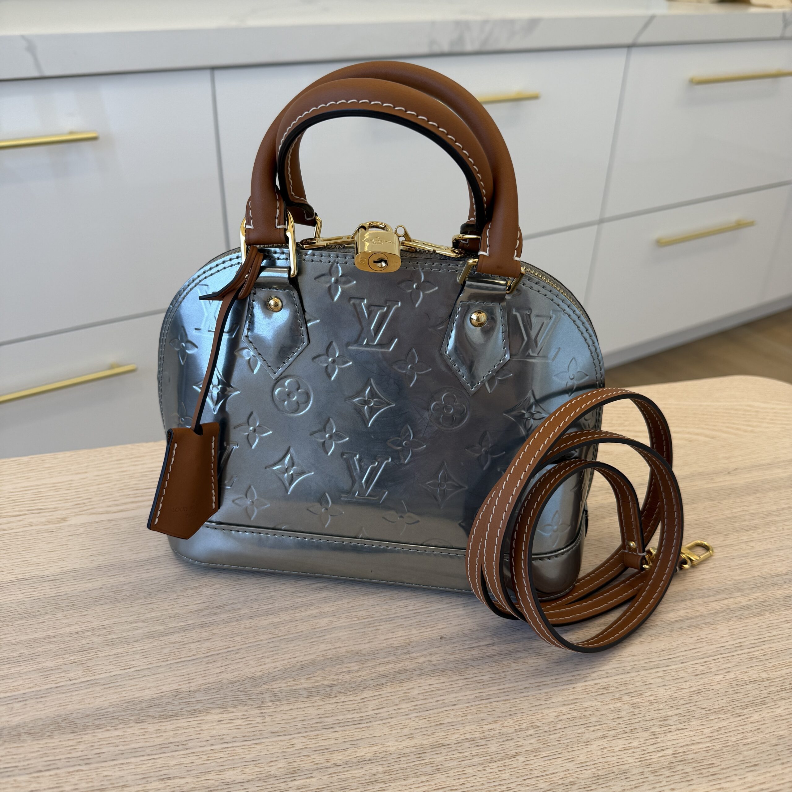 Louis Vuitton Alma Handbag Metallic Monogram Vernis with Leather BB