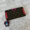 Louis Vuitton Monogram Totem Zippy Wallet Flamingo