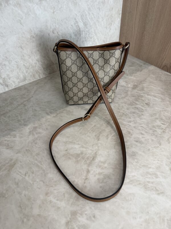 Gucci GG Emblem Nano Bucket Bag