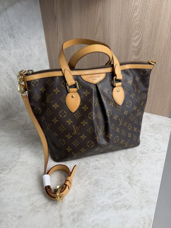 https://www.herauthentic.com/louis-vuitton-damier-ebene-speedy-35-5/