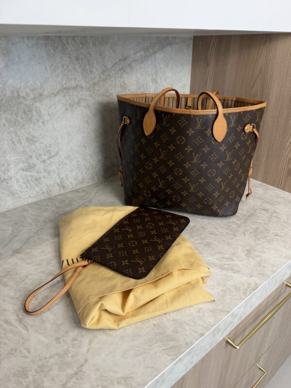https://www.herauthentic.com/louis-vuitton-grained-calfskin-low-key-cabas-mm-black/
