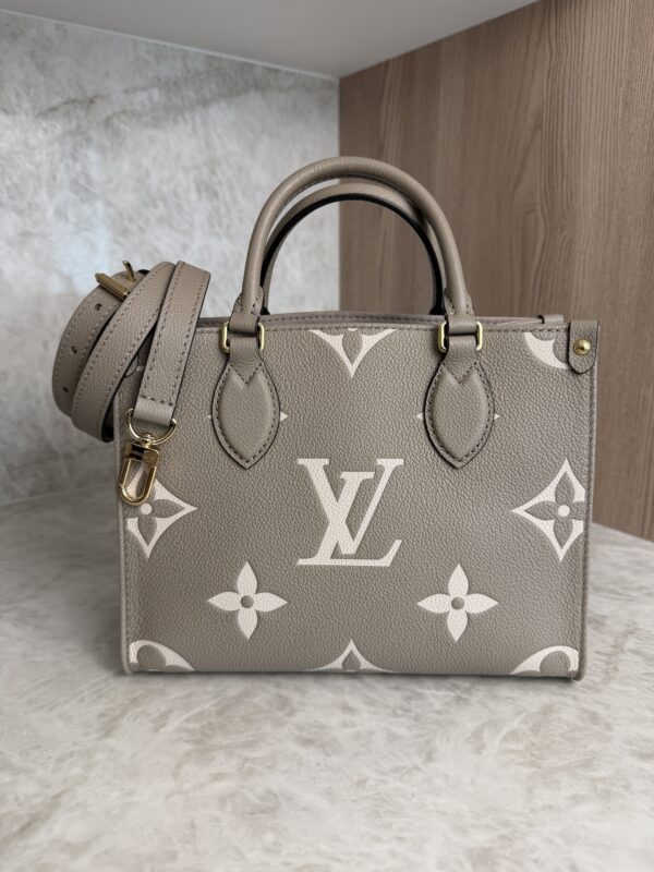 Louis Vuitton Onthego PM Bicolor Monogram Empreinte Leather Dove and Cream