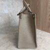 Louis Vuitton Onthego PM Bicolor Monogram Empreinte Leather Dove and Cream