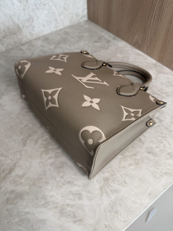 Louis Vuitton Onthego PM Bicolor Monogram Empreinte Leather Dove and Cream