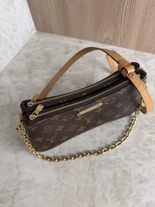 Louis Vuitton Liv Pochette Monogram Canvas
